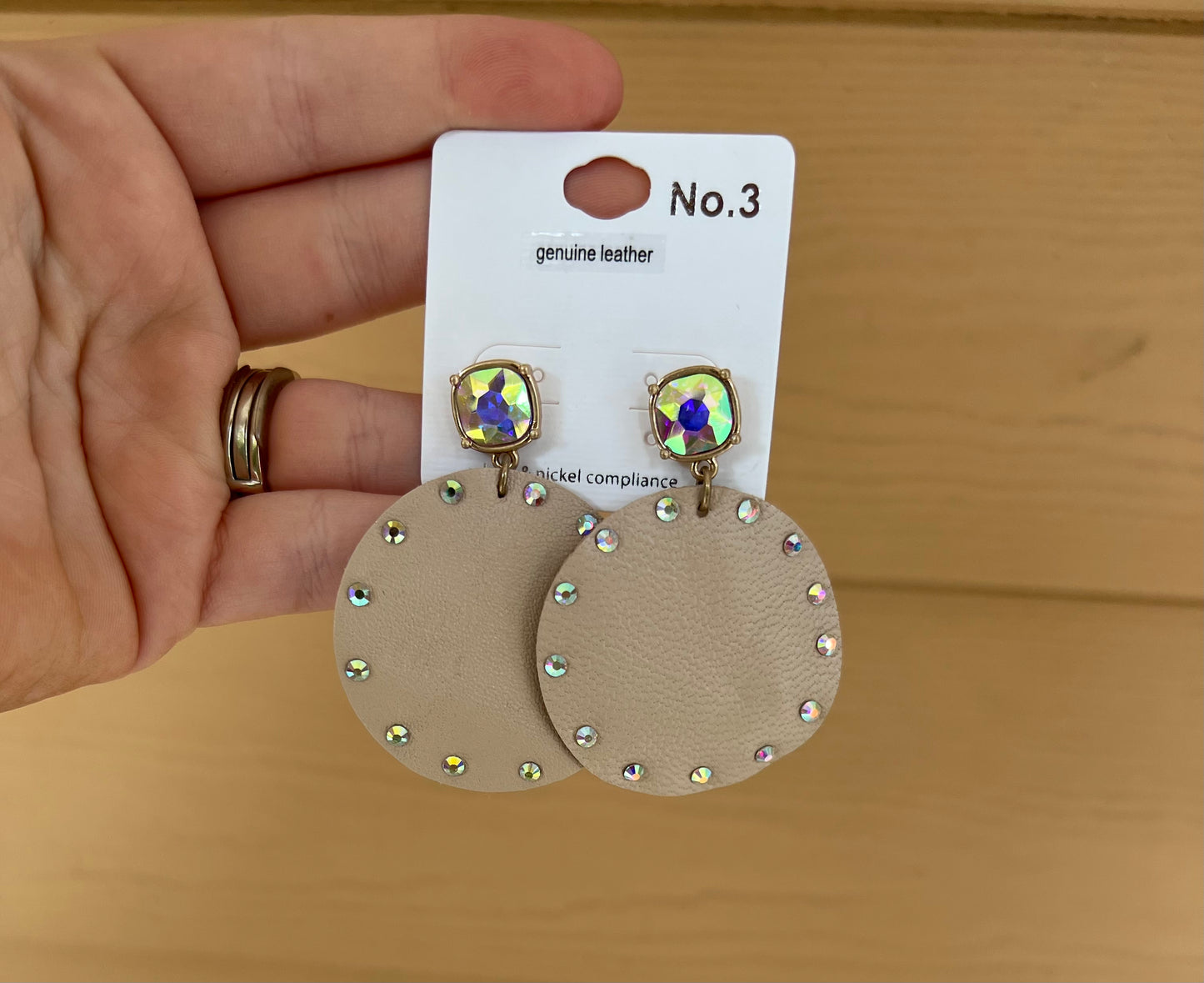 Iridescent trimmed circle earrings