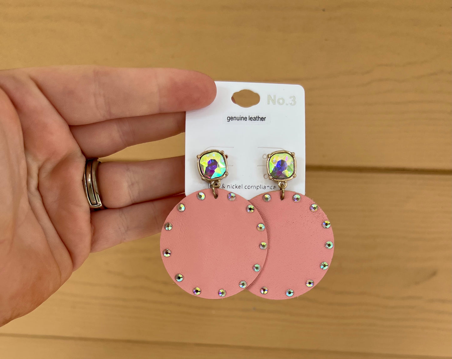 Iridescent trimmed circle earrings