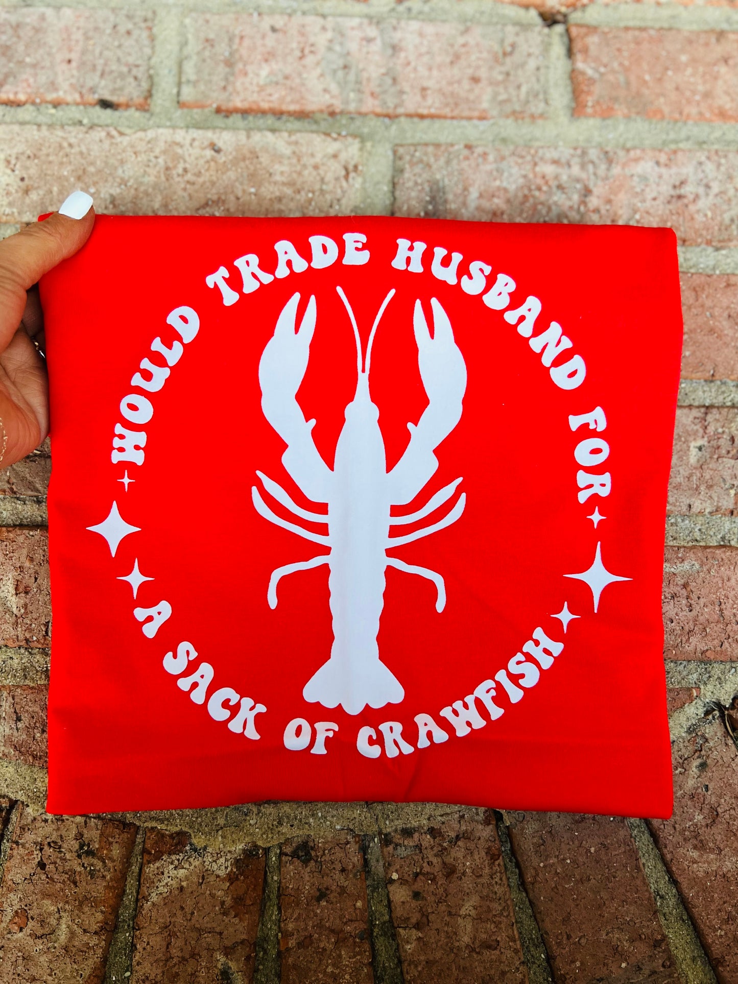 Would trade husband for a sack of crawfish tee