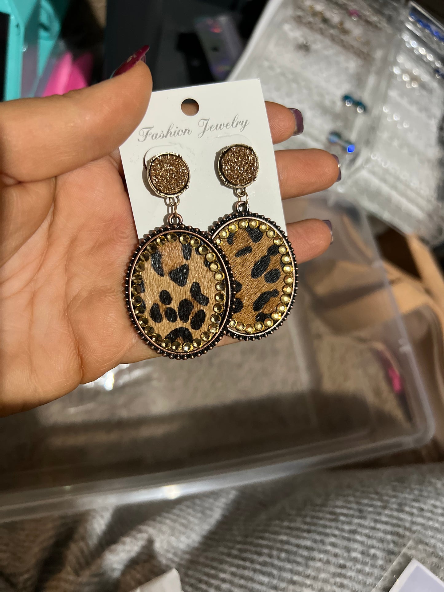 Iridescent trimmed leopard earrings