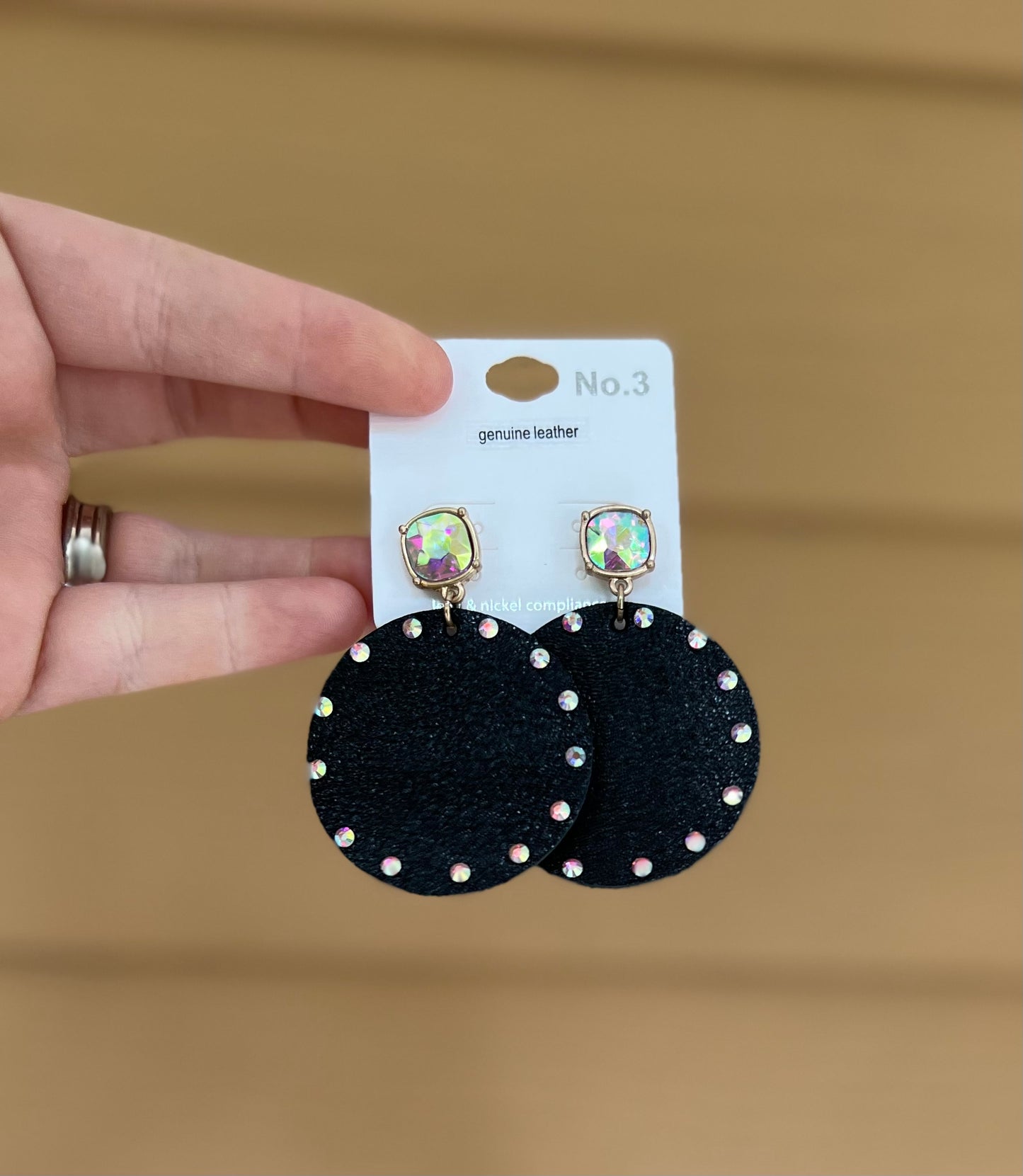 Iridescent trimmed circle earrings